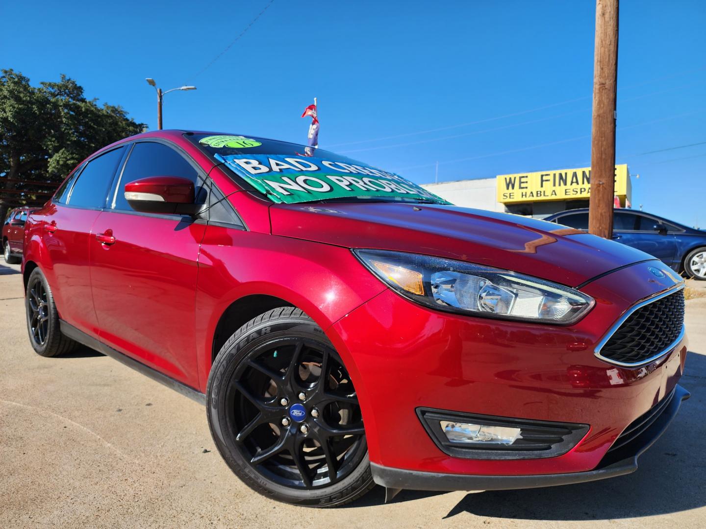 2016 BURGUNDY Ford Focus SE (1FADP3F25GL) with an 2.0L L4 DOHC 16V engine, AUTO transmission, located at 2660 S.Garland Avenue, Garland, TX, 75041, (469) 298-3118, 32.885551, -96.655602 - Welcome to DallasAutos4Less, one of the Premier BUY HERE PAY HERE Dealers in the North Dallas Area. We specialize in financing to people with NO CREDIT or BAD CREDIT. We need proof of income, proof of residence, and a ID. Come buy your new car from us today!! This is a Super Clean 2016 FORD FOCUS - Photo#0